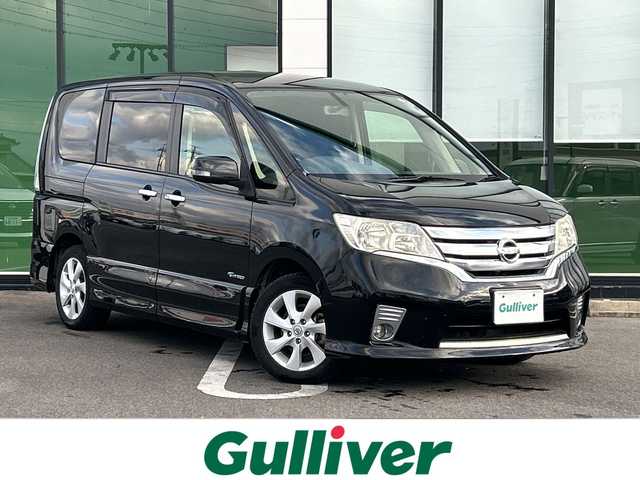 日産 セレナ ハイウェイS G Sハイブリッド 岐阜県 2012(平24)年 8.9万km スーパーブラック 登録時走行距離88896km/後席モニター/社外８インチナビ/フルセグＴＶ/バックカメラ/両側パワースライドドア/クルーズコントロール/純正アルミホイール/純正フロアマット/Ｂｌｕｅｔｏｏｔｈ接続/ＣＤチェンジャー/スマートキー/スペアキー/プッシュスタート/キセノンヘッドライト/オートライト/アイドリングストップ/パワーステアリング/パワーウィンドウ