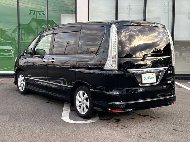 日産 セレナ ハイウェイS G Sハイブリッド 岐阜県 2012(平24)年 8.9万km スーパーブラック 登録時走行距離88896km/後席モニター/社外８インチナビ/フルセグＴＶ/バックカメラ/両側パワースライドドア/クルーズコントロール/純正アルミホイール/純正フロアマット/Ｂｌｕｅｔｏｏｔｈ接続/ＣＤチェンジャー/スマートキー/スペアキー/プッシュスタート/キセノンヘッドライト/オートライト/アイドリングストップ/パワーステアリング/パワーウィンドウ