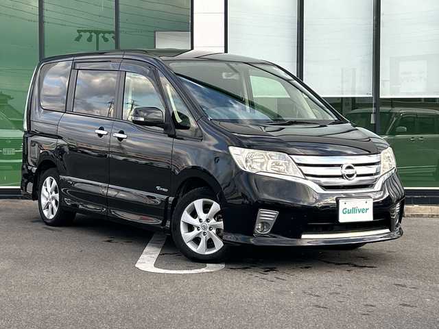 日産 セレナ ハイウェイS G Sハイブリッド 岐阜県 2012(平24)年 8.9万km スーパーブラック 登録時走行距離88896km/後席モニター/社外８インチナビ/フルセグＴＶ/バックカメラ/両側パワースライドドア/クルーズコントロール/純正アルミホイール/純正フロアマット/Ｂｌｕｅｔｏｏｔｈ接続/ＣＤチェンジャー/スマートキー/スペアキー/プッシュスタート/キセノンヘッドライト/オートライト/アイドリングストップ/パワーステアリング/パワーウィンドウ