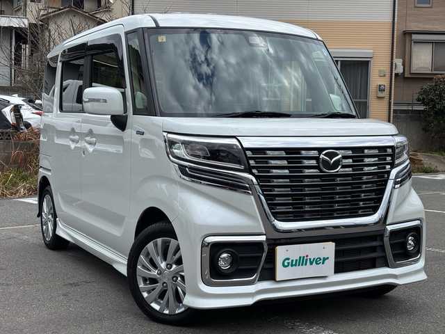 マツダ フレアワゴン カスタムスタイル ハイブリッド XG 福岡県 2020(令2)年 5.6万km ピュアホワイトP ワンオーナー/純正ディーラーナビオプション/（AM/FM/iPod/Bluetooth/SMARTUSEN/ワンセグTV）/アイドリングストップ/パーキングアシスト/レーンキープアシスト/衝突被害軽減システム/横滑り防止装置/ヒートシーター（D）/パワースライドドア（片側）/ハンズフリー/プッシュスタート/純正フロアマット/純正アルミホイール/電格ミラー/スペアキー×１/保証書/取扱説明書