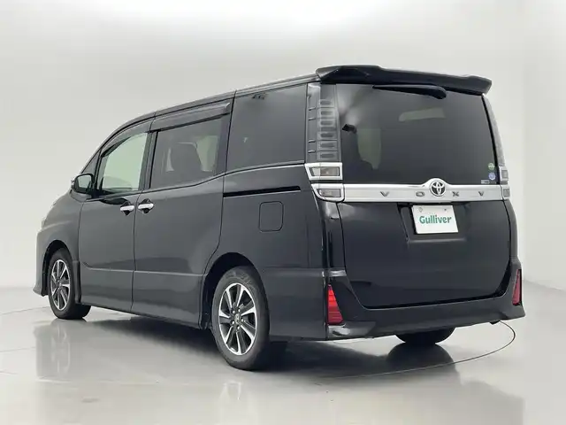 トヨタ ヴォクシー ZS 煌 熊本県 2018(平30)年 8万km ブラック 禁煙車　/社外ナビEX11Z（ＣＤ・ＤＶＤ・フルセグ・ＢＴ・ＳＤ・ＵＳＢ）/アルパインフリップダウンモニター　/バックカメラ　/ビルトインＥＴＣ　/両側パワースライドドア　/衝突軽減ブレーキ　/レーンキープアシスト/横滑り防止/アイドリングストップ/純正フロアマット/純正１６インチAW/オートライト/オートマチックハイビーム/LEDヘッドライト/フォグライト/スマートキー/プッシュスタート/スペアキー1本/保証書