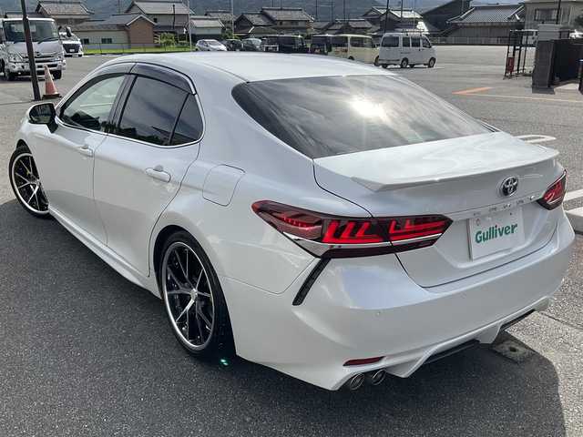 トヨタ カムリ WS 滋賀県 2018(平30)年 7.9万km プラチナホワイトパールマイカ 車検令和9年3月まで/WEDSマーベリック19インチアルミホイール/フルタップ車高調(BLITZ ZZ-R)/エイムゲイン純VIP SPORTフロントアンダースポイラー/社外テールランプ/純正LEDヘッドライト/・純正LEDフォグランプ/ハーフレザーシート/・運転席パワーシート/８インチ純正ナビゲーション/・フルセグTV/・CD/DVD/・Bluetooth/・USBコネクター/バックカメラ/ビルトインETC/ステアリングリモコン/・オーディオ操作/・クルーズコントロール/クリアランスソナー/スペアキー/取扱説明書