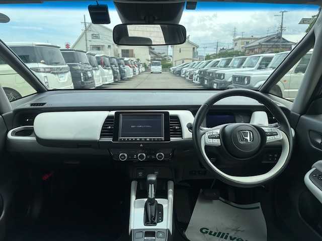 ホンダ フィット e:HEVホーム 大阪府 2020(令2)年 0.8万km ライトブルー ８インチナビ　/フルセグ　/バックカメラ　/ハーフレーザーシート　/レーダークルーズコントロール　/エアロ　/前後ドライブレコーダー　/ＥＴＣ　ＬＥＤヘッドライト　/スマートキー　/純正フロアーマット　/サイドバイザー