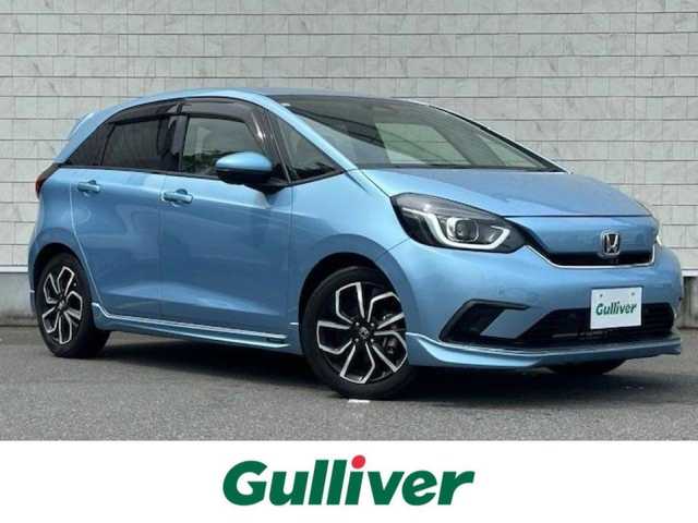 ホンダ フィット e:HEVホーム 大阪府 2020(令2)年 0.8万km ライトブルー ８インチナビ　/フルセグ　/バックカメラ　/ハーフレーザーシート　/レーダークルーズコントロール　/エアロ　/前後ドライブレコーダー　/ＥＴＣ　ＬＥＤヘッドライト　/スマートキー　/純正フロアーマット　/サイドバイザー