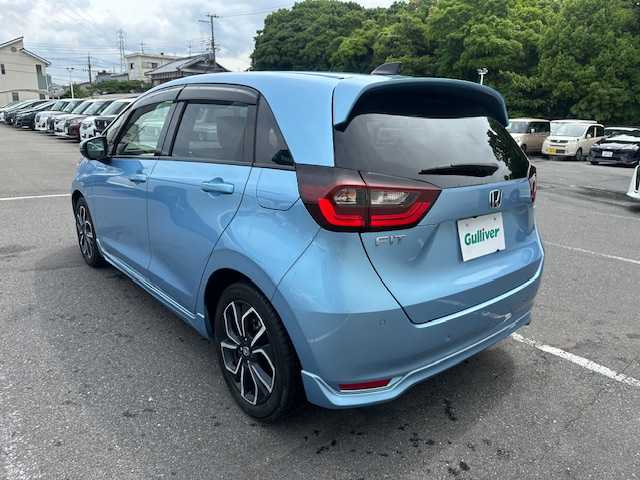 ホンダ フィット e:HEVホーム 大阪府 2020(令2)年 0.8万km ライトブルー ８インチナビ　/フルセグ　/バックカメラ　/ハーフレーザーシート　/レーダークルーズコントロール　/エアロ　/前後ドライブレコーダー　/ＥＴＣ　ＬＥＤヘッドライト　/スマートキー　/純正フロアーマット　/サイドバイザー