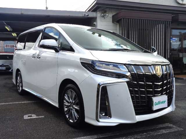 トヨタ アルファード S タイプゴールドⅢ 鹿児島県 2022(令4)年 4.4万km ホワイトパールクリスタルシャイン 純正リモコンエンジンスターター（ドアロック機能付）/9インチディスプレイオーディオ/（フルセグＴＶ．DVD.CD.Bluetooth.USBポート．ラジオ/12．1インチフリップダウンモニター（V12T-R68C)/AC100V電源/ツインサンルーフ /ビルトインETC2.0/ブラインドスポットモニター/クルーズコントロール/両側パワースライドドア/ユピテル前後ドラレコ（DRY-TW7550d)/2列目シートオットマン付/専用ハーフレザーシート/電動パーキング（ホールド機能付）/革巻きステアリグ/リモコンキー3個（エンジンスタター含み）/LEDライト．フォグランプ/取扱説明書．メンテナンスノート．ドラレコ．ETC. エンジンスタター取説有り