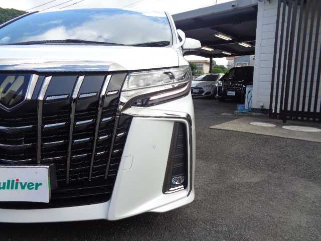 トヨタ アルファード S タイプゴールドⅢ 鹿児島県 2022(令4)年 4.4万km ホワイトパールクリスタルシャイン 純正リモコンエンジンスターター（ドアロック機能付）/9インチディスプレイオーディオ/（フルセグＴＶ．DVD.CD.Bluetooth.USBポート．ラジオ/12．1インチフリップダウンモニター（V12T-R68C)/AC100V電源/ツインサンルーフ /ビルトインETC2.0/ブラインドスポットモニター/クルーズコントロール/両側パワースライドドア/ユピテル前後ドラレコ（DRY-TW7550d)/2列目シートオットマン付/専用ハーフレザーシート/電動パーキング（ホールド機能付）/革巻きステアリグ/リモコンキー3個（エンジンスタター含み）/LEDライト．フォグランプ/取扱説明書．メンテナンスノート．ドラレコ．ETC. エンジンスタター取説有り