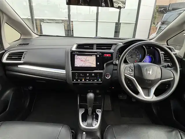 ホンダ フィット 15X 宮城県 2015(平27)年 7.9万km クリスタルブラックパール 登録時走行距離78286ｋｍ/純正7インチワイドナビ　/AM・FM・ワンセグTV・Bluetooth・CD・HDMI/ETC/バックカメラ/ドライブレコーダー（前後）/純正フロアマット/盗難防止装置/スペアキー/スマートキー/プッシュスタート/ウインカーミラー/シートカバー（全席）/電動格納ミラー/ヘッドライトイベライザー/ECONモード