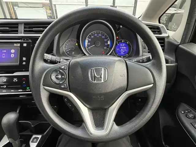 ホンダ フィット 15X 宮城県 2015(平27)年 7.9万km クリスタルブラックパール 登録時走行距離78286ｋｍ/純正7インチワイドナビ　/AM・FM・ワンセグTV・Bluetooth・CD・HDMI/ETC/バックカメラ/ドライブレコーダー（前後）/純正フロアマット/盗難防止装置/スペアキー/スマートキー/プッシュスタート/ウインカーミラー/シートカバー（全席）/電動格納ミラー/ヘッドライトイベライザー/ECONモード