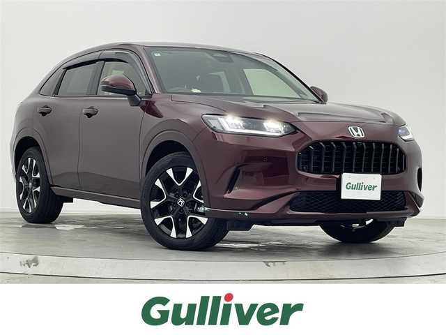 ホンダ ＺＲ－Ｖ ハイブリッド e:HEV Z 宮城県 2024(令6)年 0.6万km ダークアンバーメタリック 4WD/Ｈｏｎｄａ　ＣＯＮＮＥＣＴディスプレー　/ハンズフリーアクセスパワーテールゲート/マルチビューカメラシステム/Ｈｏｎｄａ　ＳＥＮＳＩＮＧ　/　・アダプティブクルーズコントロール　/　・衝突被害軽減ブレーキ　/　・車線維持支援システム　/　・横滑り防止装置　/　・アダプティブドライビングビーム　/　・ヒルディセントコントロール　/　・先行車発進お知らせ　/　・標識認識機能　/前後コーナーセンサー/オートライト/LEDライト/ＢＯＳＥプレミアムサウンドシステム　/ビルトインETC2.0/全席シートヒーター/前席パワーシート /レザーシート/ステアリングヒーター/レザーステアリング/純正フロアマット/プッシュスタート/スマートキー/スペアキー/サイドバイザー/純正アルミホイール