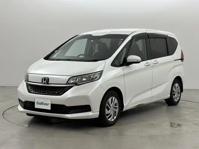 ホンダ フリード＋ G ホンダセンシング 福岡県 2020(令2)年 2.1万km プラチナホワイトパール 純正ナビ　/両側電動スライドドア　/衝突軽減システム　/バックカメラ　/ドラレコ　/クルーズコントロール　/先行車発進検知　/レーンキープ　/アイドリングストップ　/ＥＴＣ　/フォグランプ　/横滑り防止装置　/オートライト