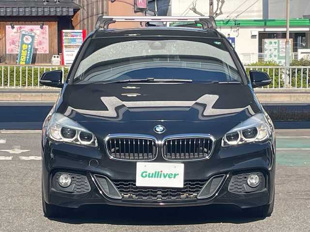 ＢＭＷ ２１８ｉ アクティブツアラー Mスポーツ 愛知県 2015(平27)年 7万km サファイアブラックP /禁煙車//純正ナビ//フルセグテレビ//AM、FM、CD、DVD、Bluetooth//バックカメラ//ドライブレコーダー//ETC//プッシュスタート//サイドブレーキボタン//ステアリングチルト//アイドリングストップ//ブレーキアシスト//電動格納ミラー//横滑り防止装置//車線逸脱警告//ABS//トラクションコントロール//自動防眩ミラー//集中ドアロック//盗難防止システム//後席3点シートベルト//オットマン//ルーフレール//革巻ステア//保証書//取扱説明書