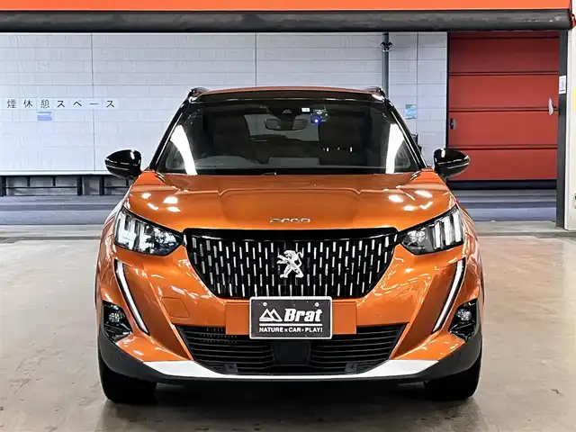 プジョー ２００８ GT 千葉県 2022(令4)年 5.2万km オレンジ ワンオーナー/ターボ/純正ディスプレイ（ナビ内蔵）/バックカメラ/ハーフレザーシート/前席シートヒーター/アクティブセーフティブレーキ/クルーズコントロール/パーキングセンサー/アンビエンスライト/前後ドラレコ/パドルシフト/ルーフレール/LEDヘッドライト/フォグランプ/BSM/スマートキー/純正フロアマット