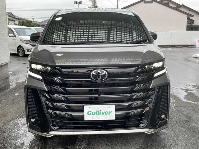 トヨタ ヴェルファイア ハイブリット Z プレミア 愛知県 2025(令7)年 0.1千km グレーＭ ワンオーナー/左右独立ムーンルーフ/トヨタチームメイト/【アドバンストパーク・パーキングサポートブレーキ（周辺静止物）・アドバンストドライブ・緊急時操舵支援・フロントクロストラフィックアラート・レーンチェンジアシスト・ドライバーモニターカメラ】/Toyota Safety Sense/【プリクラッシュセーフティ・レーントレーシングアシスト・全車速追従機能付レーダークルーズコントロール・アダプティブハイビームシステム/・ロードサインアシスト・ドライバー異常時対応システム・プロアクティブドライビングアシスト・発進遅れ告知機能・BSM】/パーキングサポートブレーキ/デジタルインナーミラー/14インチディスプレイオーディオ/【車載ナビ・地デジTV・Mira cast】/ETC2.0/パノラミックビューモニター/ヘッドアップディスプレイ/両側パワースライドドア/パワーバックドア/本革シート/シートヒーター/ベンチレーション/ステアリングヒーター/置くだけ充電/新車保証書/スペアキーあり