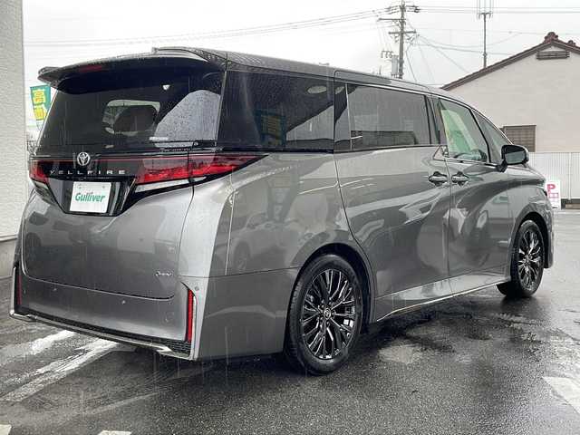 トヨタ ヴェルファイア ハイブリット Z プレミア 愛知県 2025(令7)年 0.1千km グレーＭ ワンオーナー/左右独立ムーンルーフ/トヨタチームメイト/【アドバンストパーク・パーキングサポートブレーキ（周辺静止物）・アドバンストドライブ・緊急時操舵支援・フロントクロストラフィックアラート・レーンチェンジアシスト・ドライバーモニターカメラ】/Toyota Safety Sense/【プリクラッシュセーフティ・レーントレーシングアシスト・全車速追従機能付レーダークルーズコントロール・アダプティブハイビームシステム/・ロードサインアシスト・ドライバー異常時対応システム・プロアクティブドライビングアシスト・発進遅れ告知機能・BSM】/パーキングサポートブレーキ/デジタルインナーミラー/14インチディスプレイオーディオ/【車載ナビ・地デジTV・Mira cast】/ETC2.0/パノラミックビューモニター/ヘッドアップディスプレイ/両側パワースライドドア/パワーバックドア/本革シート/シートヒーター/ベンチレーション/ステアリングヒーター/置くだけ充電/新車保証書/スペアキーあり