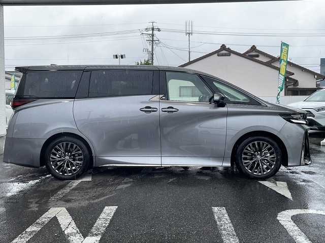 トヨタ ヴェルファイア ハイブリット Z プレミア 愛知県 2025(令7)年 0.1千km グレーＭ ワンオーナー/左右独立ムーンルーフ/トヨタチームメイト/【アドバンストパーク・パーキングサポートブレーキ（周辺静止物）・アドバンストドライブ・緊急時操舵支援・フロントクロストラフィックアラート・レーンチェンジアシスト・ドライバーモニターカメラ】/Toyota Safety Sense/【プリクラッシュセーフティ・レーントレーシングアシスト・全車速追従機能付レーダークルーズコントロール・アダプティブハイビームシステム/・ロードサインアシスト・ドライバー異常時対応システム・プロアクティブドライビングアシスト・発進遅れ告知機能・BSM】/パーキングサポートブレーキ/デジタルインナーミラー/14インチディスプレイオーディオ/【車載ナビ・地デジTV・Mira cast】/ETC2.0/パノラミックビューモニター/ヘッドアップディスプレイ/両側パワースライドドア/パワーバックドア/本革シート/シートヒーター/ベンチレーション/ステアリングヒーター/置くだけ充電/新車保証書/スペアキーあり