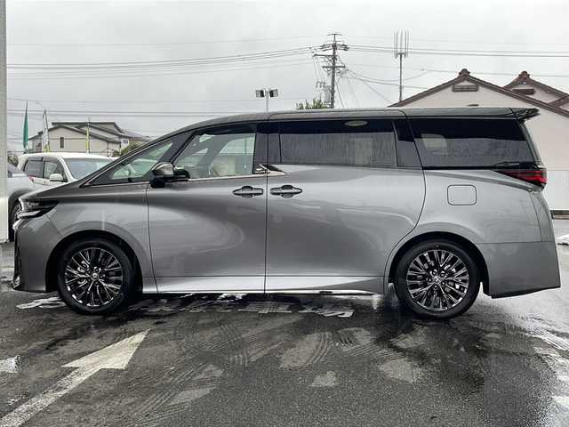トヨタ ヴェルファイア ハイブリット Z プレミア 愛知県 2025(令7)年 0.1千km グレーＭ ワンオーナー/左右独立ムーンルーフ/トヨタチームメイト/【アドバンストパーク・パーキングサポートブレーキ（周辺静止物）・アドバンストドライブ・緊急時操舵支援・フロントクロストラフィックアラート・レーンチェンジアシスト・ドライバーモニターカメラ】/Toyota Safety Sense/【プリクラッシュセーフティ・レーントレーシングアシスト・全車速追従機能付レーダークルーズコントロール・アダプティブハイビームシステム/・ロードサインアシスト・ドライバー異常時対応システム・プロアクティブドライビングアシスト・発進遅れ告知機能・BSM】/パーキングサポートブレーキ/デジタルインナーミラー/14インチディスプレイオーディオ/【車載ナビ・地デジTV・Mira cast】/ETC2.0/パノラミックビューモニター/ヘッドアップディスプレイ/両側パワースライドドア/パワーバックドア/本革シート/シートヒーター/ベンチレーション/ステアリングヒーター/置くだけ充電/新車保証書/スペアキーあり