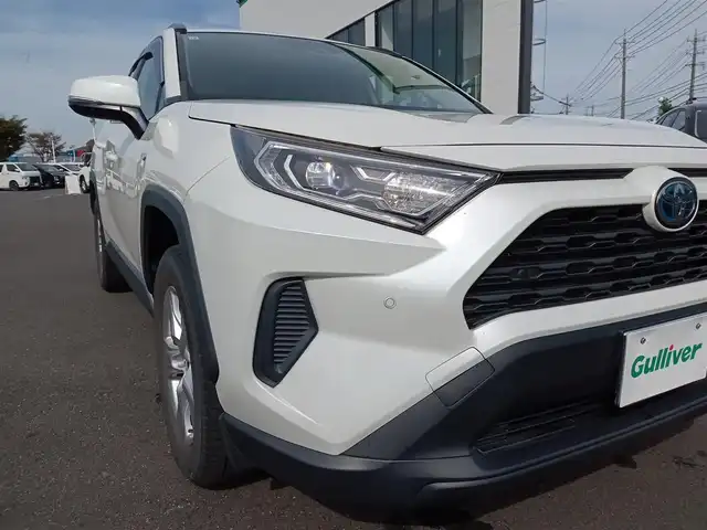 トヨタ ＲＡＶ４ ハイブリットX 福井県 2019(令1)年 6.2万km ホワイトパールクリスタルシャイン レーダークルーズコントロール/純正SDナビ（NSZT-Y68T）/・（フルセグTV/CD/DVD/Bluetooth）/バックカメラ/ビルトインETC/ドライブレコーダー/ステアリングスイッチ/オートブレーキホールド/スタッドレスタイヤ積込/純正フロアマット/純正17インチAW/スマートキー