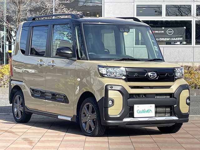 ダイハツ タント ファンクロスターボ 福島県 2023(令5)年 1.4万km ブラックマイカメタリック/サンドベージュメタリック 4WD/ターボ/純正9inディスプレイオーディオ/　【USB/BT/apple carplay/Android Auto】/バックカメラ/両側パワースライドドア/前席シートヒーター/アイドリングストップ/横滑り防止機能/パーキングアシスト/衝突軽減システム/LEDヘッドライト（AUTO機能付き）/　・フォグランプ/ヘッドライトレベライザー/コーナーセンサー/純正フロアマット/プッシュスタート/新車保証書/取扱説明書/スペアキー×１