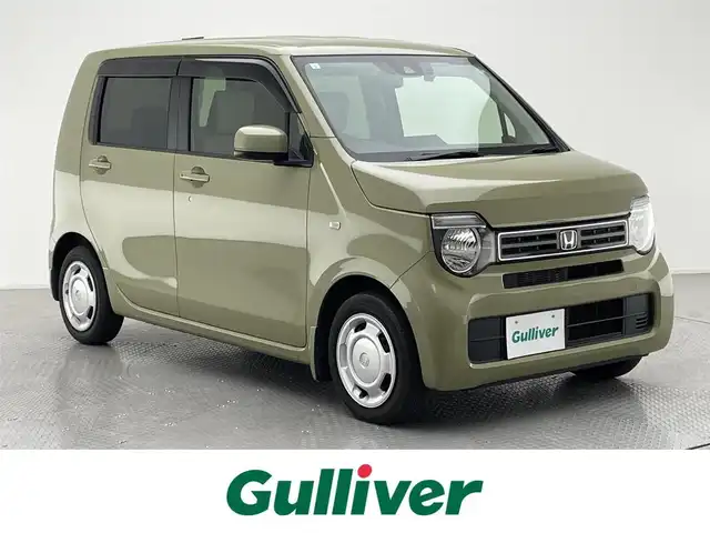 ホンダ Ｎ ＷＧＮ L ホンダセンシング 兵庫県 2021(令3)年 2.7万km ガーデングリーンM 純正メモリナビ/（CD/DVD/SD/Bluetooth/フルセグTV）/・VXM-214VFi/バックカメラ/ホンダセンシング/アダクティブクルーズコントロール/LKA/プリクラッシュセーフティー/クリアランスソナー/横滑り防止装置/盗難防止装置/カーテンエアバッグ/後方コーナーセンサー/D席シートヒーター/社外LEDヘッドライト/オートライト/ヘッドライトレベライザー/ビルトインETC/純正ドライブレコーダー（前後）/純正フロアマット/ドアバイザー/スマートキー/ベンチシート