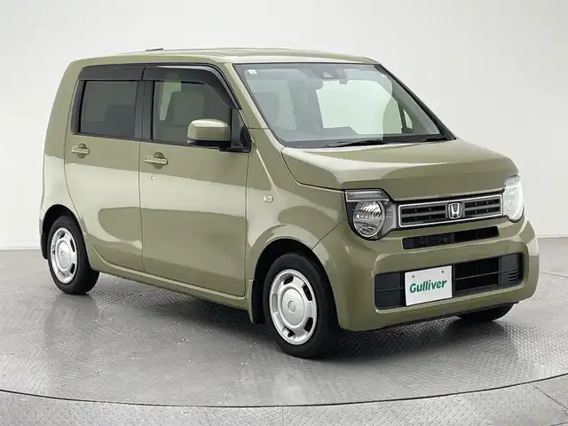 ホンダ Ｎ ＷＧＮ L ホンダセンシング 兵庫県 2021(令3)年 2.7万km ガーデングリーンM 純正メモリナビ/（CD/DVD/SD/Bluetooth/フルセグTV）/・VXM-214VFi/バックカメラ/ホンダセンシング/アダクティブクルーズコントロール/LKA/プリクラッシュセーフティー/クリアランスソナー/横滑り防止装置/盗難防止装置/カーテンエアバッグ/後方コーナーセンサー/D席シートヒーター/社外LEDヘッドライト/オートライト/ヘッドライトレベライザー/ビルトインETC/純正ドライブレコーダー（前後）/純正フロアマット/ドアバイザー/スマートキー/ベンチシート
