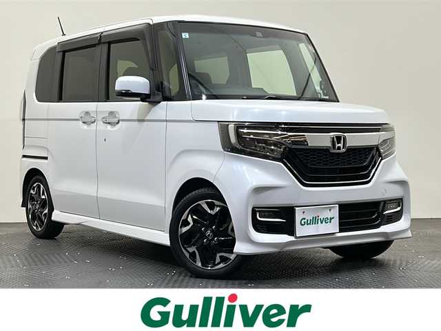 ホンダ Ｎ ＢＯＸ カスタム G L ターボ ホンダセンシング 愛媛県 2019(令1)年 5.7万km プラチナホワイトパール ・８型ナビ/（フルセグＴＶ・ＢＴ・ＣＤ・ＤＶＤ・ＳＤ・ＵＳＢ・ａｐｐｌｅ　ｃａｒｐｌａｙ）/・バックカメラ　/・１１．６型後席液晶　/・ＥＴＣ　/・前後ドラレコ　/・衝突軽減ブレーキ　/・レーダークルコン　/・両側電動ドア/・レーンキープアシスト/・レーダー探知機