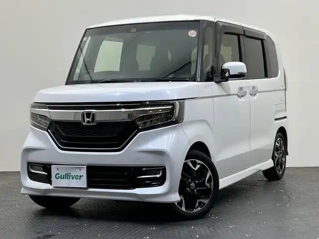 ホンダ Ｎ ＢＯＸ カスタム G L ターボ ホンダセンシング 愛媛県 2019(令1)年 5.7万km プラチナホワイトパール ・８型ナビ/（フルセグＴＶ・ＢＴ・ＣＤ・ＤＶＤ・ＳＤ・ＵＳＢ・ａｐｐｌｅ　ｃａｒｐｌａｙ）/・バックカメラ　/・１１．６型後席液晶　/・ＥＴＣ　/・前後ドラレコ　/・衝突軽減ブレーキ　/・レーダークルコン　/・両側電動ドア/・レーンキープアシスト/・レーダー探知機