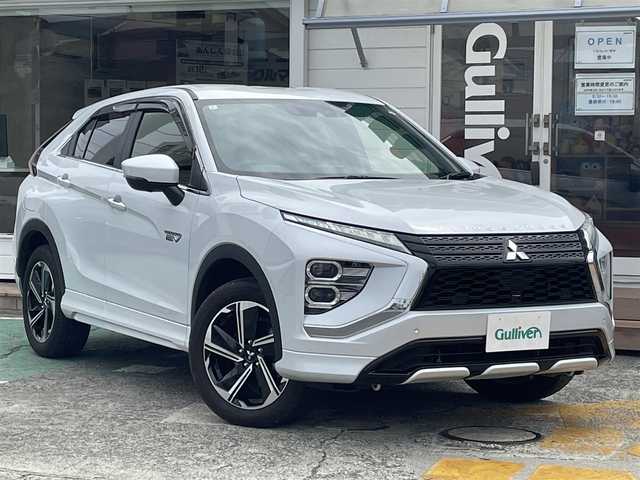 三菱 エクリプス クロス ＰＨＥＶ P 神奈川県 2023(令5)年 1.7万km ホワイトダイヤモンド ワンオーナー/純正8インチディスプレイ/　(ナビ・フルセグTV・Bluetooth・USB)/マルチアラウンドモニター/e-Assist/　・衝突被害軽減ブレーキ/　・車線逸脱警報システム/　・誤発進抑制機能/　・後側方車両検知警報システム/　・後退時交差車両検知警報システム/パーキングセンサー/MI-PILOT/　・レーダークルーズコントロール/　・車線維持支援機能/純正18インチAW/LEDヘッドライト/ヘッドアップディスプレイ/エレクトリックテールゲード/前後ドライブレコーダー/ステアリングヒーター/前席シートヒーター/スマートキー×2/保証書/取扱説明書