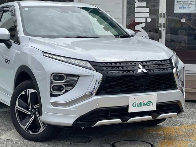 三菱 エクリプス クロス ＰＨＥＶ P 神奈川県 2023(令5)年 1.7万km ホワイトダイヤモンド ワンオーナー/純正8インチディスプレイ/　(ナビ・フルセグTV・Bluetooth・USB)/マルチアラウンドモニター/e-Assist/　・衝突被害軽減ブレーキ/　・車線逸脱警報システム/　・誤発進抑制機能/　・後側方車両検知警報システム/　・後退時交差車両検知警報システム/パーキングセンサー/MI-PILOT/　・レーダークルーズコントロール/　・車線維持支援機能/純正18インチAW/LEDヘッドライト/ヘッドアップディスプレイ/エレクトリックテールゲード/前後ドライブレコーダー/ステアリングヒーター/前席シートヒーター/スマートキー×2/保証書/取扱説明書