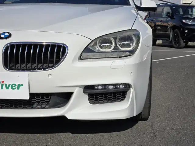 ＢＭＷ ６４０ｉ グランクーペ 鹿児島県 2012(平24)年 10.9万km アルピンホワイトⅢ ガラスルーフ　/クルーズコントロール　/ビルトインＥＴＣ　/本革シート　/HDD純正ナビ　/バックカメラ　/Ｄ＋Ｎ席シートヒーター　/Ｄ＋Ｎ席パワーシート　/Ｂｌｕｅｔｏｏｔｈオーディオ　/ドライブレコーダー/シートメモリー/ツインターボチャージャー/エンジンオートスタートストップ機能/エコプロモード/横滑り防止装置/盗難防止装置/エアバッグ(W＋サイド)