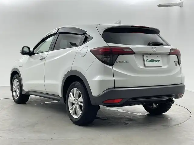 ホンダ ヴェゼル ハイブリッド X ホンダセンシング 福井県 2020(令2)年 2.5万km プラチナホワイトパール ワンオーナー/純正ナビ/CD/DVD/フルセグTV/Bluetooth/SD/USB/AUX/バックカメラ /ホンダセンシング/・マルチインフォメーションディスプレイ/・衝突軽減ブレーキ/・誤発進抑制機能/・歩行者事故提言ステアリング/・車線維持支援システム/・クルーズコントロール/・標識認識機能/プッシュスタート/スペアキー/革巻きステアリング/ステアリングリモコン/ステアリングチルド機構/ウィンカー・電動格納式ミラー/オートライト /LED/フォグランプ/純正１６インチアルミ/純正フロアマット