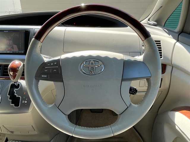 トヨタ エスティマ アエラス 長野県 2010(平22)年 13.5万km グレーメタリック 社外ナビ（FM/AM、CD、DVD、USB）/ワンセグテレビ/バックカメラ/クルーズコントロール追従無/ビルトインETC/オットマン/サード格納シート/両側パワースライドドア/純正フロアマット/純正１６AW/ダブルエアバック/キセノンオートヘッドライト/エンジンスターター/ウォークスルー/MTモード付AT/４WD/スペアキー（１本）/保証書、取扱説明書