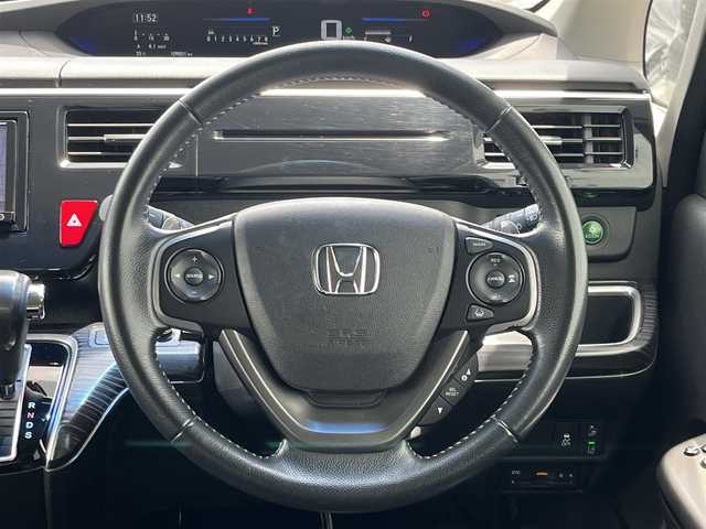 ホンダ ステップワゴン スパーダ クルスピセンシング 奈良県 2017(平29)年 11万km ホワイトオーキッドパール わくわくゲート　/社外ナビ　/地デジ　/ビルトインＥＴＣ　/衝突被害軽減システム　/車線逸脱警報　/ハーフレザーシート　/前席シートヒーター　/革巻きステアリング　/レーンキープアシスト