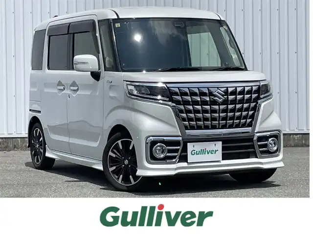 スズキ スペーシア カスタム HYBRID XS 福岡県 2018(平30)年 3.7万km ピュアホワイトP ・純正7インチナビ【CN-RE03WD】/-BT/フルセグTV/CD/DVD/FM/AM/SD/・衝突軽減ブレーキ/・クリアランスソナー/・車線逸脱警報/・横滑り防止装置/・オートライト/・オートハイビーム/・両側パワースライドドア/・前席シートヒーター/・ウィンカーミラー/・ドアバイザー/・フロアマット/・純正アルミ１５インチ/・純正フロントグリル/・フォグランプ/・アイドリングストップ/・スマートキー×２