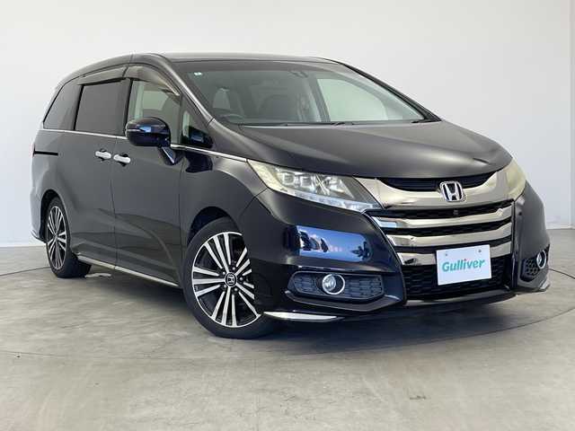 ホンダ オデッセイ アブソルート EX 新潟県 2014(平26)年 9.2万km プレミアムヴィーナスブラックP メモリナビ/フルセグテレビ/CD/DVD/Bluetooth/HDMI/バックカメラ/フリップダウンモニター/アイドリングストップ/オットマン/クルーズコントロール/両側パワースライドドア/ETC/純正フロアマット/純正アルミホイール/パワーシート