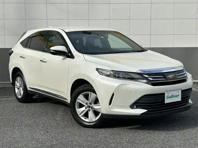 トヨタ ハリアー エレガンス 東京都 2017(平29)年 5.1万km ホワイトパールクリスタルシャイン ALPINE BIGX10型ナビ/CD/DVD/FM・AM/SD/Bluetooth/HDMI//フルセグTV/バックカメラ/ビルトインETC/ドライブレコーダー前後/プリクラッシュセーフティ/レーダークルーズコントロール/レーンディパーチャーアラート/オートハイビーム/インテリジェントクリアランスソナー/オートブレーキホールド/ハーフレザーシート/パワーシート/純正１７インチアルミホイール/AW付スタッドレスタイヤ積込/純正フロアマット/純正ドアバイザー/LEDヘッドライト/保証書/取扱説明書/スペアキー