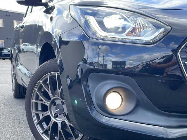 スズキ スイフト HYBRID ML 道北・旭川 2019(令1)年 6.9万km スーパーブラックパール ・４ＷＤ/・純正エンジンスターター/・社外ＳＤナビ/　ＣＤ/ＤＶＤ/ＢＴ/フルセグ/ＳＤ/・バックカメラ////スズキセーフティサポート////アダクティブクルーズコントロール/ブラインドスポットモニター/デュアルセンサーブレーキサポート/誤発進抑制機能/ハイビームアシスト/車線逸脱警報、抑制機能/ふらつき警報/標識認識機能/・社外１６インチアルミホイール/・社外１５インチアルミホイール冬タイヤ積込/・パドルシフト/・ステアリングリモコン/・ドライブレコーダー/・前席シートヒーター/・ＬＥＤライト/・オートライト/・フォグライト/・新車時保証書/・スペアキー×１