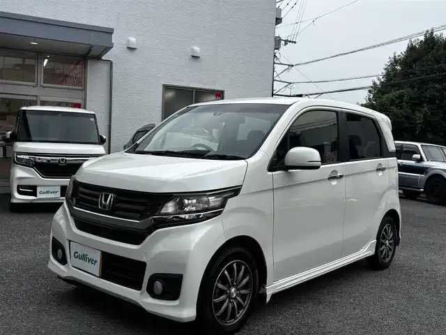 ホンダ Ｎ ＷＧＮ カスタム G 熊本県 2015(平27)年 5.4万km プレミアムホワイトパール 純正ディスプレーオーディオ/【Bluetooth/CD/HDMI/USB/FM/AM】/バックカメラ/ETC/クルーズコントロール/プッシュスタート/HID/スマートキー/オートライト/オートエアコン/ABS/横滑り防止装置/本革巻きステアリング/純正１４インチAW/ドアバイザー/保証書/取扱説明書
