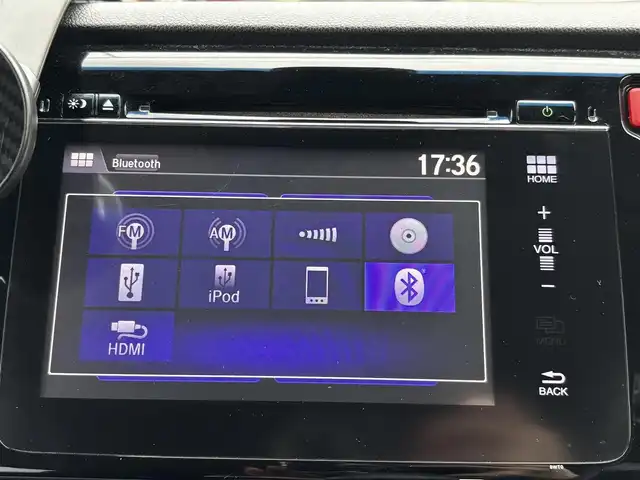 ホンダ Ｎ ＷＧＮ カスタム G 熊本県 2015(平27)年 5.4万km プレミアムホワイトパール 純正ディスプレーオーディオ/【Bluetooth/CD/HDMI/USB/FM/AM】/バックカメラ/ETC/クルーズコントロール/プッシュスタート/HID/スマートキー/オートライト/オートエアコン/ABS/横滑り防止装置/本革巻きステアリング/純正１４インチAW/ドアバイザー/保証書/取扱説明書