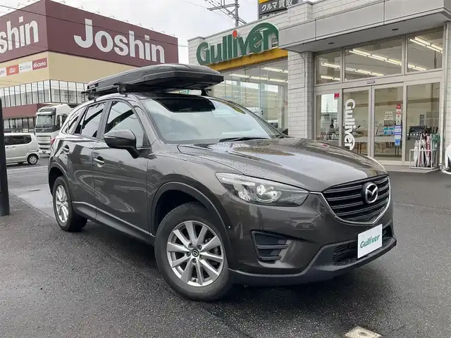 マツダ ＣＸ－５ XD 滋賀県 2015(平27)年 12.3万km 茶 ワンオーナー /純正キセノンヘッドライト/純正17インチアルミホイール/水冷直列4気筒DOHC16バルブターボ (ディーゼル)/純正ナビゲーション/・フルセグTV/・CD/DVD/・Bluetooth/バックカメラ/ALPINEフリップダウンモニター/革調シートカバー/