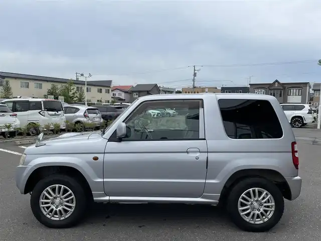 日産 キックス RX 道央・札幌 2009(平21)年 8.2万km クールシルバー ４WD/社外HDDナビ(AM/FM)/ワンセグ（走行中視聴可能）/ドアバイザー/ETC/フォグランプ/ヘッドライトレベライザー/電動格納ミラー/バニティミラー/運転席シートヒーター/積込タイヤ/スペアキー