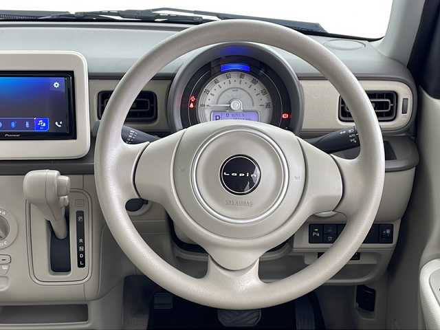 スズキ ラパン G 鹿児島県 2023(令5)年 1.6万km ピュアホワイトP 社外ディスプレイオーディオ/（BT/CD/USB）/バックカメラ/ビルトインETC/デュアルカメラブレーキサポート/誤発進抑制機能/後退時ブレーキサポート/リヤパーキングセンサー/車線逸脱警報機能/アイドリングストップ/ヘットライトレベライザー/純正14インチAW/社外フロアマット