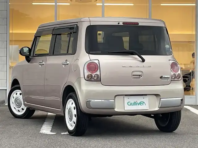 スズキ ラパン ショコラ X 宮崎県 2015(平27)年 4.8万km シャンパンピンクPM 社外SDナビ【MDV-D503】（Bluetooth/CD/DVD/TV）/ETC/プッシュスタート/スマートキー/電動格納ミラー/アイドリングストップ/純正フロアマット