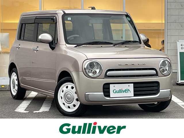 スズキ ラパン ショコラ X 宮崎県 2015(平27)年 4.8万km シャンパンピンクPM 社外SDナビ【MDV-D503】（Bluetooth/CD/DVD/TV）/ETC/プッシュスタート/スマートキー/電動格納ミラー/オートライト/キノセンヘッドランプ/アイドリングストップ/純正フロアマット