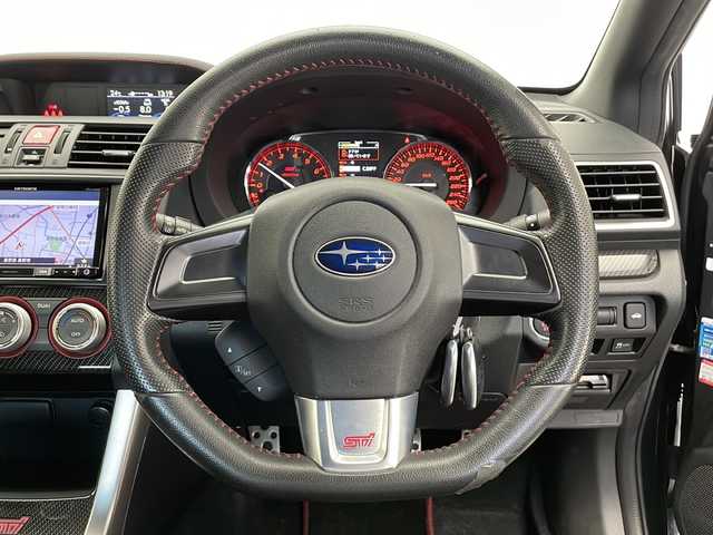 スバル ＷＲＸ ＳＴＩ STI 長野県 2016(平28)年 7.6万km ダークグレーメタリック 4WD/6MT/ターボ/純正SDナビ（DISC/SD/FM/AM//フルセグTV/Bluetooth/USB）/SI-DRIVE/DCCD（ドライバーズコントロールセンターデフ）/前方ドラレコ/フロントガラスヒーター/オートワイパー/LEDヘッドライト/ヘッドライトウォッシャー/ヘッドライトレベライザー/電格ウインカーミラー/フォグライト/リアフォグ/プッシュスタートボタン/ビルトインETC/ALL AUTOパワーウインドウ/D席パワーシート/ハーフレザーシート/純正18インチアルミ/純正McGard製ホイールロックナット/アルミスポーツペダル/インプレッサ用ラゲッジマット/スペアキー×1