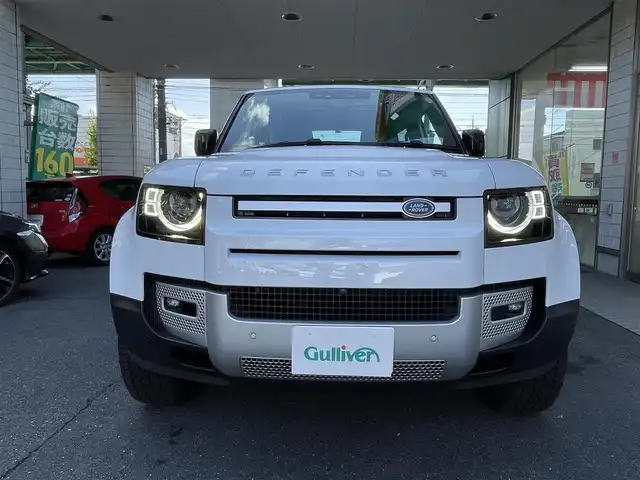 ランドローバー ランドローバー ディフェンダー 90 愛知県 2022(令4)年 2.7万km 白 スライディングパノラミックルーフ/ドライバーアシストパック/・ブラインドスポットアシスト/・クリアイジットモニター/・アダプティブクルーズコントロール/・リアコリジョンモニター/・リアクロストラフィック/純正ディスプレイナビ／Bluetooth/MERIDIANサウンドシステム/フロント・サイド・バック・全周囲カメラ/前席2wayパワーシート/純正LEDヘッドライト/エマージェンシーブレーキ/レーンキープアシスト/トラフィックサインレコグニション/純正18インチAW/USBポート/ETC2.0/スマートキー＆プッシュスタート/カラーコード1AA／フジホワイト