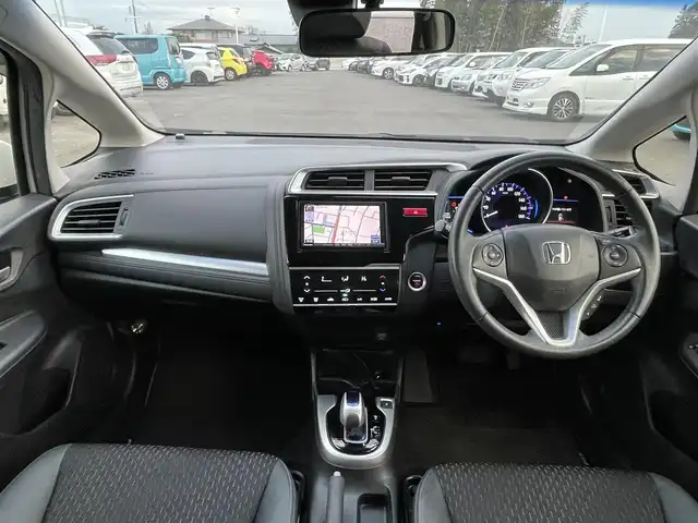 ホンダ フィット ハイブリット Lパッケージ 栃木県 2013(平25)年 7.6万km プレミアムホワイトパール 社外SDナビ/・フルセグTV/・CD/DVD/BT/・USB/SD/・AM.FM/バックカメラ/ビルトインETC/革巻きステアリング/ステアリングスイッチ/クルーズコントロール/ハーフレザーシート/LEDヘッドライト/オートライト/スマートキー/プッシュスタート/純正フロアマット/ドアバイザー/横滑り防止システム/電動格納ウィンカーミラー