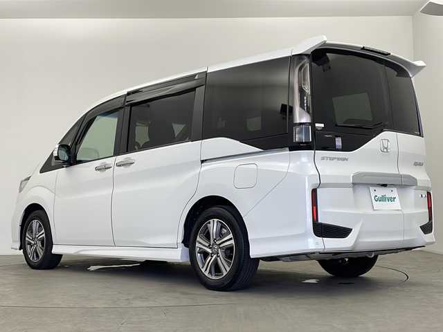 ホンダ ステップワゴン スパーダ eHEV G ホンダS 鹿児島県 2021(令3)年 2.7万km プラチナホワイトパール 禁煙/ワンオーナー /純正9インチメモリナビ フルセグ/（CD/DVD/SD/MSV/BT/AppleCarPlay）/純正フリップダウンモニター/バックカメラ /わくわくゲート/前後ドライブレコーダー /純正16AW/ビルトインETC2.0 /ECON /EVモード/両側パワースライドドア /電格ミラー/LEDオートライト /フォグランプ/革巻きステアリング /ステアリングスイッチ/ホンダセンシング /CMBS/アダプティブクルーズコントロール/コーナーセンサー/先行車発進お知らせ /路外逸脱抑制 /標識認識/レーンキープアシスト /純正マット /ドアバイザー/スマートキー /プッシュスタート/保証書 /取扱説明書 /ナビ取説 /記録簿 /スペアキー