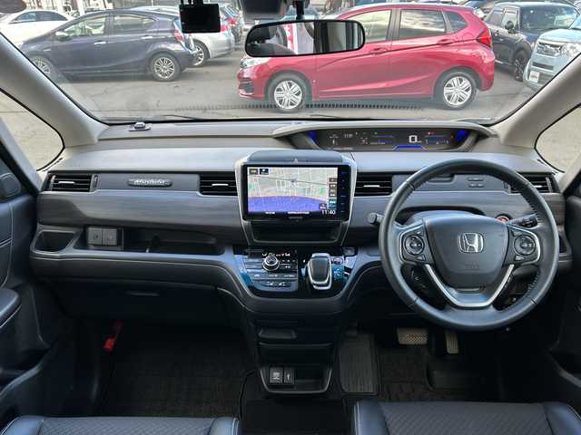 ホンダ フリード ハイブリット G ホンダセンシング 長野県 2021(令3)年 4.8万km プラチナホワイトパール ・社外メーカーオプションナビ/(Bluetooth/CD/DVD/フルセグTV/HDMI)/・バックカメラ/・USB入力端子/・前後ドライブレコーダー/・両側パワースライドドア/・純正フロアマット/・社外モデューロエアロ(フロント/サイド/リア)/・社外17インチアルミホイール/・コーナーセンサー/・レーンキープアシスト/・クルーズコントロール/・LEDヘッドライト/・社外キャリパー/・社外サブウーハー(TS-WX130DA)