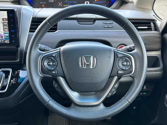 ホンダ フリード ハイブリット G ホンダセンシング 長野県 2021(令3)年 4.8万km プラチナホワイトパール ・社外メーカーオプションナビ/(Bluetooth/CD/DVD/フルセグTV/HDMI)/・バックカメラ/・USB入力端子/・前後ドライブレコーダー/・両側パワースライドドア/・純正フロアマット/・社外モデューロエアロ(フロント/サイド/リア)/・社外17インチアルミホイール/・コーナーセンサー/・レーンキープアシスト/・クルーズコントロール/・LEDヘッドライト/・社外キャリパー/・社外サブウーハー(TS-WX130DA)